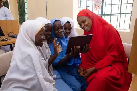 Teachers engaging with students in classroom